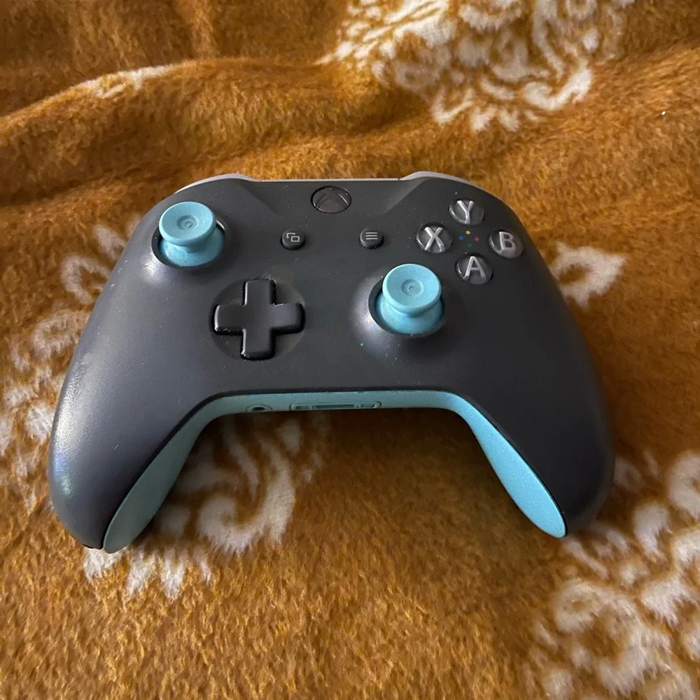 X Box one controller. Missing battery cover and thumb pad. Tested & working fine